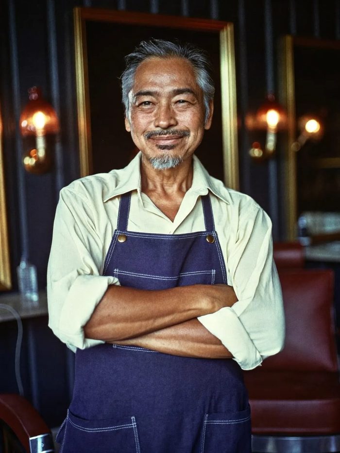 Portrait of Ben Reyes, master barber at The Barber Parlor