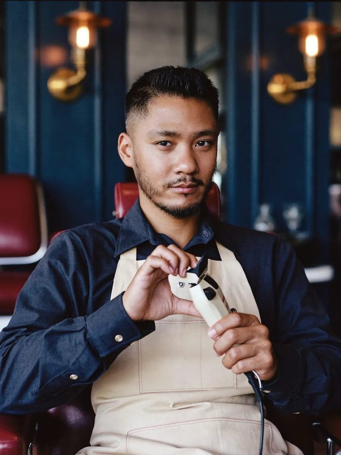 Portrait of Marco Villanueva, senior barber at The Barber Parlor